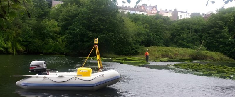 Image of someone doing a hydographic survey as part of flood relief
